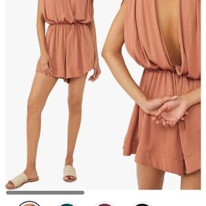 Free People romper. Runs large.
